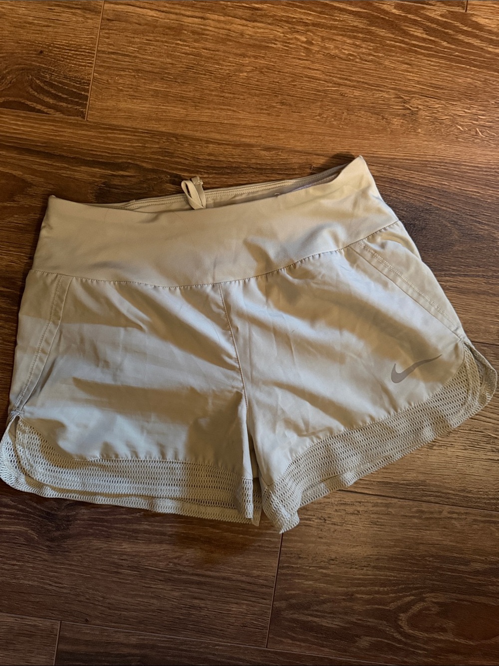 Nike Women's Light Beige Athletic Shorts with Mesh Trim